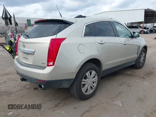 2014 Cadillac SRX Luxury Collection with VIN 3GYFNBE38ES518054, listed as a IAAI auction lot 41520886 with 108,905 mi miles and . Bid and sale history available at DreamBid. Image 4.
