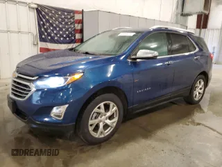 2021 Chevrolet Equinox Premier z VIN 2GNAXXEV0M6105445, wystawiony jako Copart lot #50958475 z przebiegiem 70 802 mil mil oraz Szkoda całkowita • Salvage title. Historia ofert i sprzedaży dostępna na DreamBid. Obrazek 1.