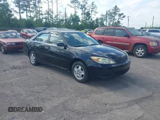 2002 Toyota Camry LE z VIN JTDBE32K720027774, wystawiony jako IAAI lot #42028580 z przebiegiem 212 904 mil mil oraz . Historia ofert i sprzedaży dostępna na DreamBid. Obrazek 1.