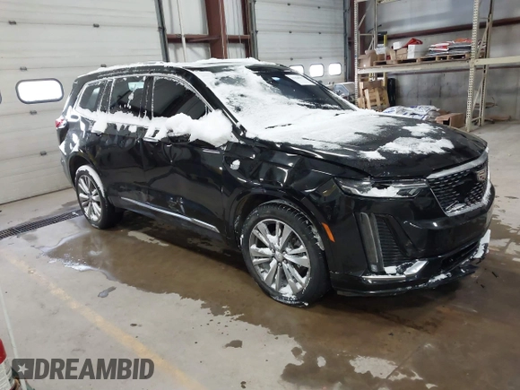 2022 Cadillac XT6 Premium Luxury with VIN 1GYKPDRS7NZ112856, listed as a IAAI auction lot 41328577 with 1 mi miles. Bid and sale history available at carsss.com. Image 1.