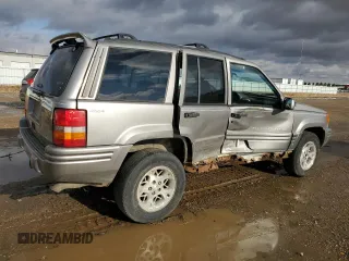 1997 Jeep Grand Cherokee Limited with VIN 1J4GZ78Y0VC556381, listed as a Copart auction lot 46221845 with 191,778 mi miles and Salvage Title. Bid and sale history available at carsss.com. Image 3.