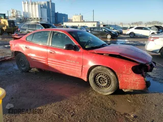 1999 Pontiac Grand Am SE2 with VIN 1G2NE52T5XM831139, listed as a Copart auction lot 89160335 with 120,900 mi miles and Salvage Title. Bid and sale history available at carsss.com. Image 4.