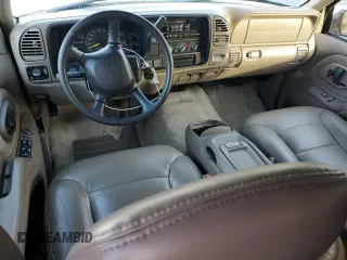 1999 GMC Yukon with VIN 1GKEK13RXXJ735870, listed as a Copart auction lot 44988505 with 150,557 mi miles and Salvage Title. Bid and sale history available at carsss.com. Image 8.
