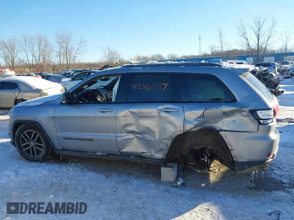 2017 Jeep Grand Cherokee Trailhawk with VIN 1C4RJFLT4HC657682, listed as a IAAI auction lot 41286507 with 123,646 mi miles and . Bid and sale history available at DreamBid. Image 14.