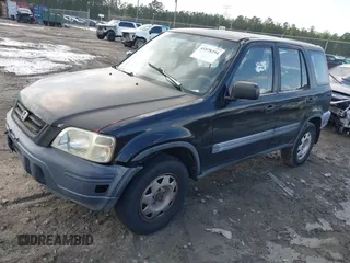 2000 Honda CR-V LX with VIN JHLRD2841YC012945, listed as a IAAI auction lot 41878294 with 306,110 mi miles. Bid and sale history available at carsss.com. Image 2.