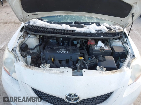2009 Toyota Yaris z VIN JTDBT903991341371, wystawiony jako IAAI lot #41472292 z przebiegiem 205 596 mil mil oraz . Historia ofert i sprzedaży dostępna na DreamBid. Obrazek 10.