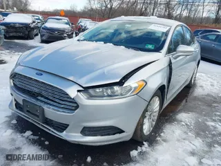 2014 Ford Fusion SE Hybrid with VIN 3FA6P0LU6ER334941, listed as a IAAI auction lot 41444793 with 144,332 mi miles. Bid and sale history available at carsss.com. Image 6.