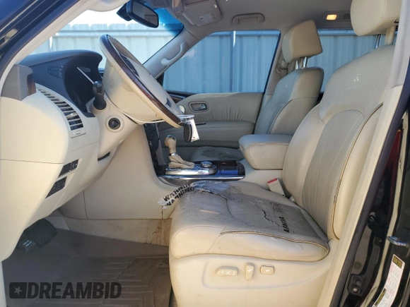 2012 Infiniti QX56 7-passenger z VIN JN8AZ2NE1C9020448, wystawiony jako Copart lot #76786414 z przebiegiem 188 572 mil mil oraz Tytuł czysty. Historia ofert i sprzedaży dostępna na DreamBid. Obrazek 7.