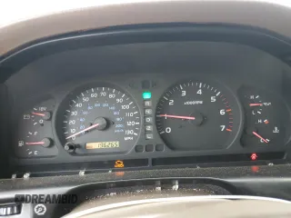 1999 Toyota Land Cruiser z VIN JT3HT05J9X0055914, wystawiony jako Copart lot #57261305 z przebiegiem 196 265 mil mil oraz Szkoda całkowita • Salvage title. Historia ofert i sprzedaży dostępna na DreamBid. Obrazek 9.
