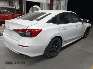 2023 Honda Civic Sport with VIN 2HGFE2F52PH531718, listed as a IAAI auction lot 42483695 with 21,781 mi miles and . Bid and sale history available at DreamBid. Image 4.