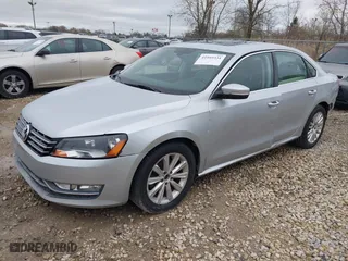 2012 Volkswagen Passat SEL with VIN 1VWCP7A34CC079912, listed as a IAAI auction lot 41993331 with 114,110 mi miles. Bid and sale history available at carsss.com. Image 2.