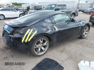 2011 Nissan 370Z Touring with VIN JN1AZ4EH3BM550677, listed as a IAAI auction lot 42217431 with 182,904 mi miles and . Bid and sale history available at DreamBid. Image 4.