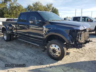 2022 Ford Super Duty F-450 DRW XL with VIN 1FT8W4DT9NEE32836, listed as a Copart auction lot 42381085 with 55,679 mi miles and Salvage Title. Bid and sale history available at carsss.com. Image 4.