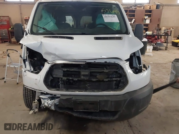 2016 Ford Transit Cargo z VIN 1FTYE1YM1GKB30742, wystawiony jako IAAI lot #41357645 z przebiegiem 240 747 mil mil oraz . Historia ofert i sprzedaży dostępna na DreamBid. Obrazek 6.