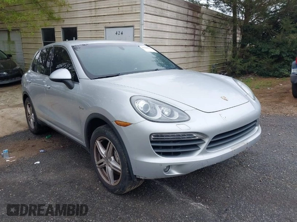 2012 Porsche Cayenne S Hybrid z VIN WP1AE2A2XCLA90082, wystawiony jako IAAI lot #41960714 z przebiegiem 139 081 mil mil oraz . Historia ofert i sprzedaży dostępna na DreamBid. Obrazek 1.