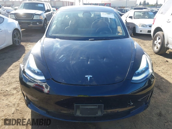 2022 Tesla Model 3 with VIN 5YJ3E1EA9NF295890, listed as a IAAI auction lot 41175917 with 42,230 mi miles and . Bid and sale history available at DreamBid. Image 13.