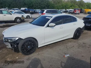 2022 BMW 3 Series 330i with VIN 3MW5R1J03N8C69555, listed as a Copart auction lot 55785155 with 47,573 mi miles and Salvage title. Bid and sale history available at DreamBid. Image 1.