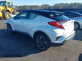 2021 Toyota C-HR LE with VIN JTNKHMBXXM1105546, listed as a IAAI auction lot 41486068 with 87,099 mi miles. Bid and sale history available at carsss.com. Image 3.