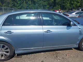 2011 Toyota Avalon with VIN 4T1BK3DB8BU439373, listed as a IAAI auction lot 42604951 with 143,942 mi miles and . Bid and sale history available at DreamBid. Image 14.
