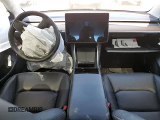 2020 Tesla Model 3 Standard Range Plus with VIN 5YJ3E1EA4LF784677, listed as a Copart auction lot 50515825 with Not Provided miles and Salvage Title. Bid and sale history available at DreamBid. Image 8.