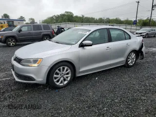 2011 Volkswagen Jetta SE with VIN 3VWDZ7AJ5BM319091, listed as a Copart auction lot 57991585 with 185,458 mi miles and Salvage title. Bid and sale history available at DreamBid. Image 1.