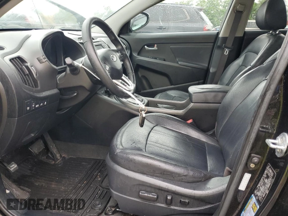 2012 Kia Sportage SX with VIN KNDPCCA60C7280931, listed as a Copart auction lot 60897545 with 136,903 mi miles and Salvage title. Bid and sale history available at DreamBid. Image 7.