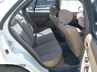 1996 Toyota Camry DX z VIN JT2BG12K8T0368612, wystawiony jako IAAI lot #42248750 z przebiegiem 122 237 mil mil oraz . Historia ofert i sprzedaży dostępna na DreamBid. Obrazek 8.