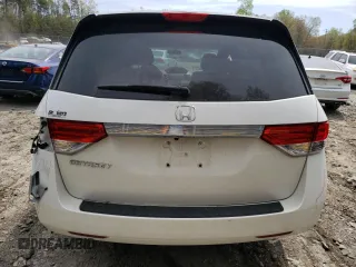 2014 Honda Odyssey LX with VIN 5FNRL5H27EB116435, listed as a Copart auction lot 52864825 with 94,643 mi miles and Salvage Title. Bid and sale history available at DreamBid. Image 6.