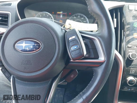 2021 Subaru Ascent Touring z VIN 4S4WMARD3M3464619, wystawiony jako IAAI lot #42259846 z przebiegiem 30 696 mil mil oraz . Historia ofert i sprzedaży dostępna na DreamBid. Obrazek 11.