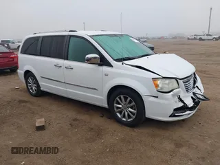 2014 Chrysler Town & Country Touring L with VIN 2C4RC1CG0ER449639, listed as a IAAI auction lot 41164630 with 125,464 mi miles and . Bid and sale history available at carsss.com. Image 1.