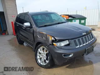 2015 Jeep Grand Cherokee Summit with VIN 1C4RJFJT1FC726330, listed as a IAAI auction lot 41781127 with 138,425 mi miles. Bid and sale history available at carsss.com. Image 1.
