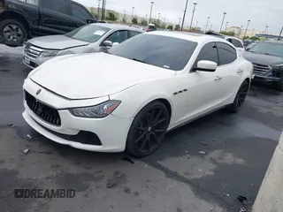 2014 Maserati Ghibli S Q4 with VIN ZAM57RTA3E1090350, listed as a IAAI auction lot 42056682 with 119,160 mi miles and . Bid and sale history available at DreamBid. Image 2.