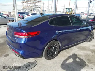 2018 Kia Optima SX with VIN 5XXGV4L29JG208284, listed as a IAAI auction lot 41765005 with 77,189 mi miles. Bid and sale history available at carsss.com. Image 4.