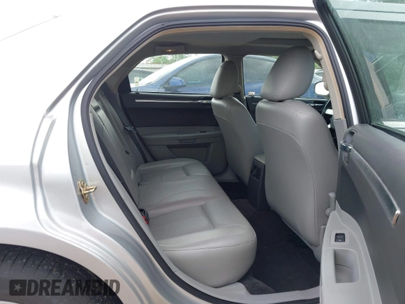 2006 Chrysler 300 Touring with VIN 2C3KA53GX6H113815, listed as a IAAI auction lot 42149912 with 144,813 mi miles. Bid and sale history available at carsss.com. Image 8.