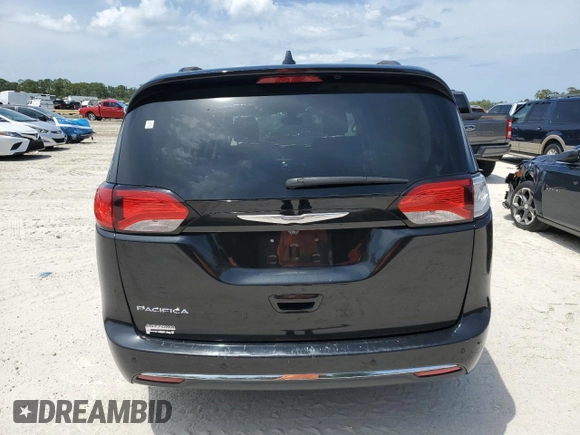 2017 Chrysler Pacifica Touring L with VIN 2C4RC1BG7HR551641, listed as a Copart auction lot 51810185 with 66,860 mi miles and Salvage Title. Bid and sale history available at DreamBid. Image 6.
