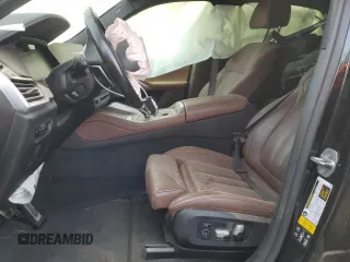 2021 BMW X6 M50i with VIN 5UXCY8C05M9H31042, listed as a Copart auction lot 64614714 with 0 mi miles and Salvage Title. Bid and sale history available at carsss.com. Image 7.