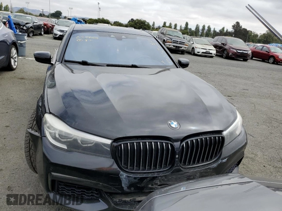 2017 BMW 7 Series 740i with VIN WBA7E2C56HG739456, listed as a Copart auction lot 64728303 with Not Provided miles and . Bid and sale history available at DreamBid. Image 5.