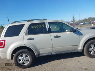 2008 Ford Escape XLT with VIN 1FMCU93158KA39754, listed as a IAAI auction lot 40660179 with 113,956 mi miles. Bid and sale history available at carsss.com. Image 13.