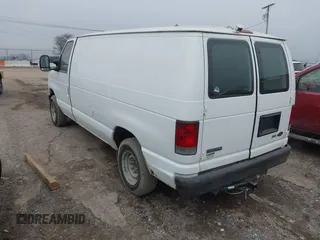 2009 Ford Econoline Cargo Commercial with VIN 1FTNE14W09DA93314, listed as a IAAI auction lot 41502673 with 251,052 mi miles and . Bid and sale history available at DreamBid. Image 3.