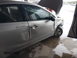 2014 Kia Forte LX with VIN KNAFK4A67E5059911, listed as a IAAI auction lot 42105858 with 183,067 mi miles. Bid and sale history available at carsss.com. Image 6.