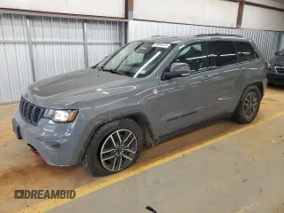 2020 Jeep Grand Cherokee Trailhawk with VIN 1C4RJFLG2LC385290, listed as a Copart auction lot 58893615 with 64,462 mi miles and Salvage title. Bid and sale history available at DreamBid. Image 1.