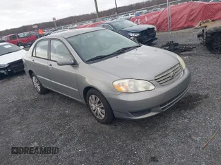 2004 Toyota Corolla CE with VIN 2T1BR32E24C309957, listed as a IAAI auction lot 41894304 with 299,999 mi miles. Bid and sale history available at carsss.com. Image 1.