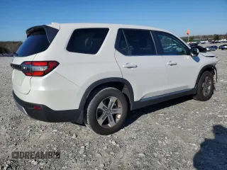 2023 Honda Pilot EX-L 8 Passenger with VIN 5FNYG2H49PB011916, listed as a Copart auction lot 87109874 with 12,461 mi miles and Salvage Title. Bid and sale history available at carsss.com. Image 3.