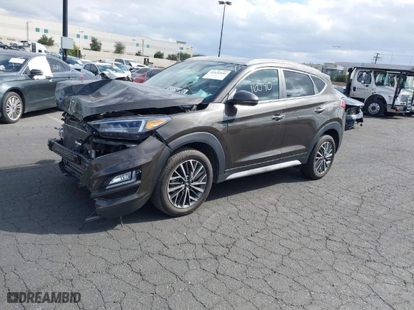 2020 Hyundai Tucson Sport with VIN KM8J33AL1LU128648, listed as a IAAI auction lot 41476040 with 66,526 mi miles. Bid and sale history available at carsss.com. Image 2.