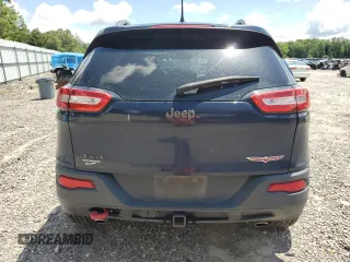2014 Jeep Cherokee Trailhawk with VIN 1C4PJMBS7EW170345, listed as a Copart auction lot 60565765 with 98,382 mi miles and Salvage title. Bid and sale history available at DreamBid. Image 6.