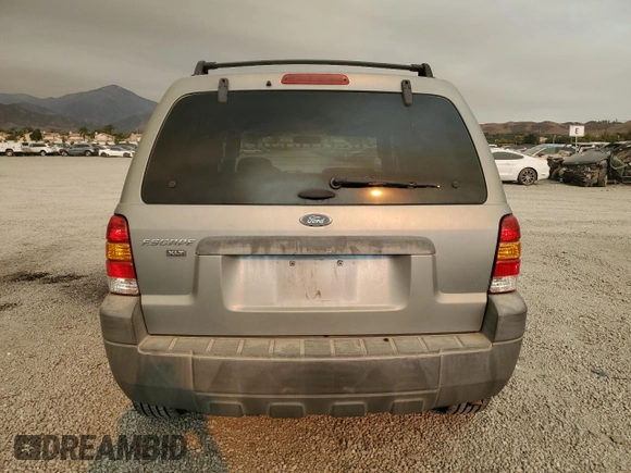 2005 Ford Escape XLT with VIN 1FMYU93Z35KC52175, listed as a Copart auction lot 71214694 with 125,278 mi miles and Salvage Title. Bid and sale history available at carsss.com. Image 6.