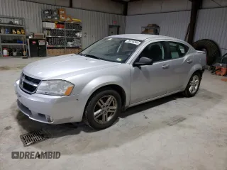 2009 Dodge Avenger SXT with VIN 1B3LC56B29N541319, listed as a Copart auction lot 82766654 with 157,138 mi miles and Salvage title. Bid and sale history available at DreamBid. Image 1.