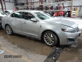 2012 Lincoln MKS EcoBoost with VIN 1LNHL9FT2CG800385, listed as a IAAI auction lot 41327953 with 174,908 mi miles and . Bid and sale history available at DreamBid. Image 1.