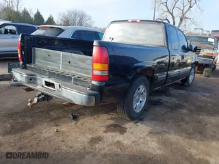 1999 Chevrolet Silverado 1500 LS with VIN 2GCEC19T4X1165256, listed as a IAAI auction lot 41236272 with 77,004 mi miles. Bid and sale history available at carsss.com. Image 4.