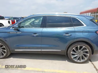 2019 Lincoln Nautilus Reserve z VIN 2LMPJ6L95KBL42845, wystawiony jako IAAI lot #42159408 z przebiegiem 37 856 mil mil oraz . Historia ofert i sprzedaży dostępna na DreamBid. Obrazek 14.